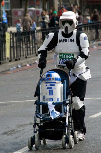 Storm trooper with R2D2 in stroller