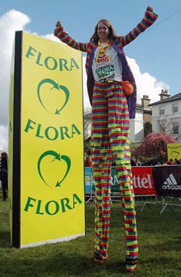 First woman to complete marathon on stilts